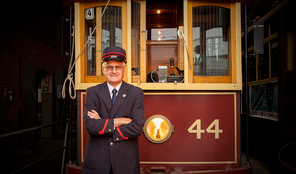Tram Driver standing in front of a tram at the Bendigo Tramways Depot
