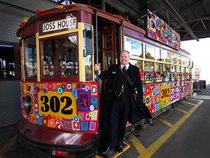 Tram Conductor aboard Bendigo Tramways Yarn Bomb Tram
