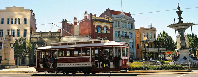 Bendigo Tramways Vintage Talking Tram Tour passing historic buildings on Pall Mall