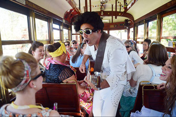 Elvis impersonator performing aboard a Bendigo Tramways Tram for Hens Party